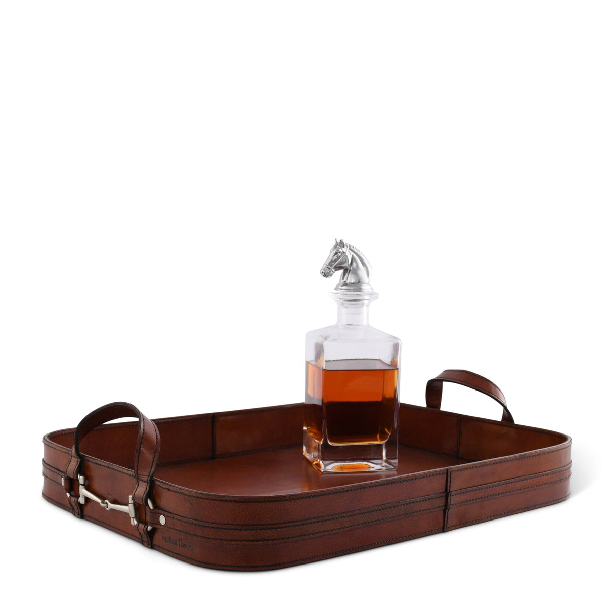 Elegant brown leather tray with a horse head-topped glass decanter filled with amber liquid.