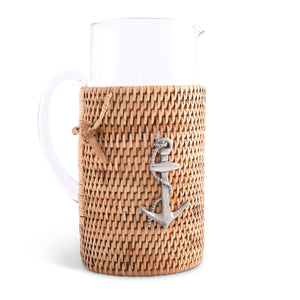 Vagabond House Sea and Shore Anchor Glass Pitcher Hand Woven Wicker Natural Rattan Cover