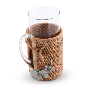 Vagabond House Tropical Tales Orchid Glass Pitcher Hand Woven Wicker Natural Rattan Cover