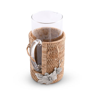 Vagabond House Tropical Tales Orchid Glass Pitcher Hand Woven Wicker Natural Rattan Cover